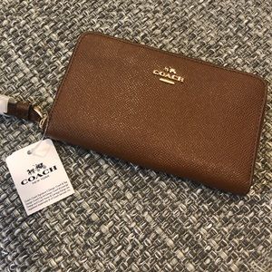 Coach zip around brown canvas wallet wristlet